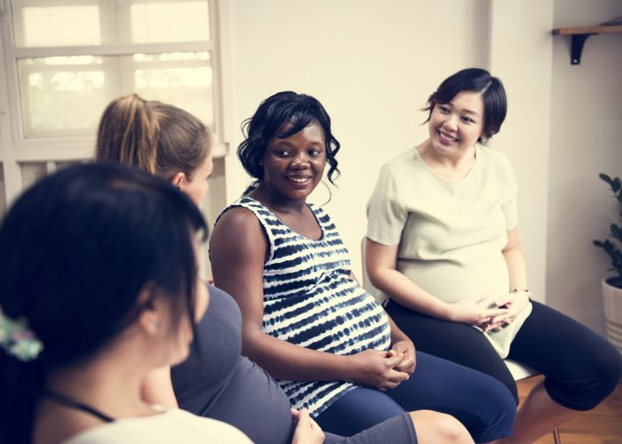 Pregnant women in a class